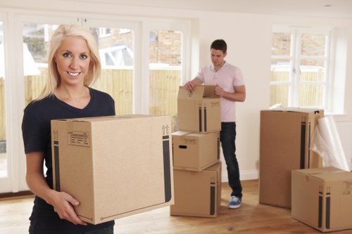 Customer storing belongings in a secure self storage unit