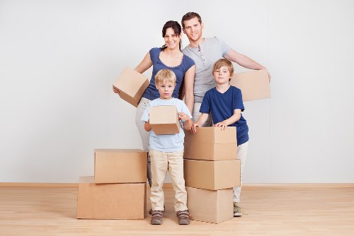 Careful packing of fragile items for house removals in Ealing