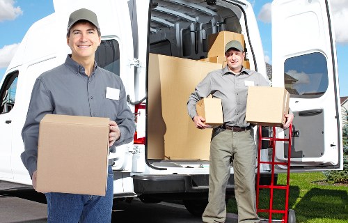 Packing team organising household items for relocation in Ealing